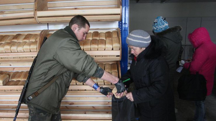 Террористы внедряют систему "Еда за труд". Фото: Г. Музашвили