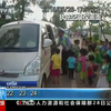 В Китаї вчителі всадили 60 школярів у дві машини