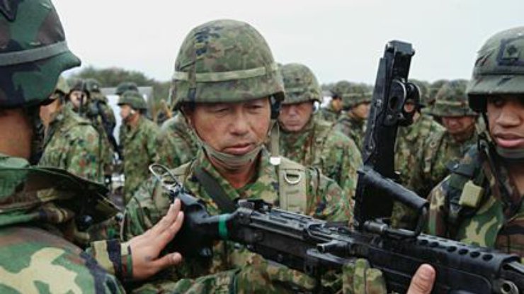 Законопроект позволяет японской армии участвовать в боевых действиях за рубежом.