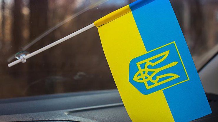 Россиянин избил белоруса за украинский флаг