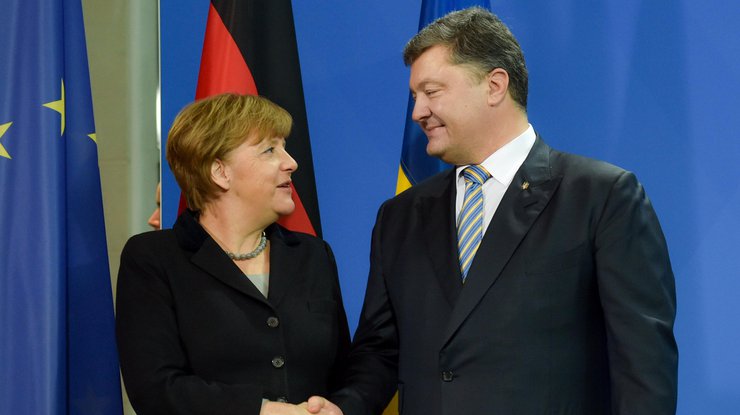 Порошенко и Меркель договорились ускорить Минский процесс