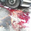 Под Киевом из горящего грузовика потекли "кровавые" химикаты (фото)