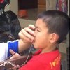 Отец удалил сыну зубы арбалетом (видео)