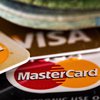 Visa и MasterCard повысят абонплату