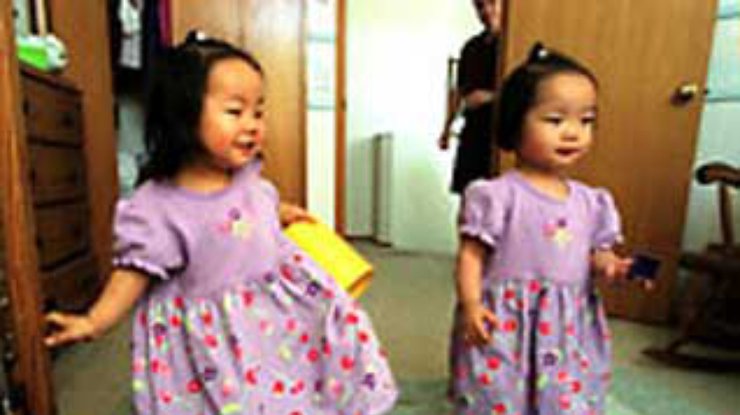 В Китае все больше близнецов