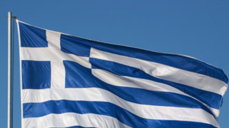 Европейские лидеры решили простить Греции половину долга