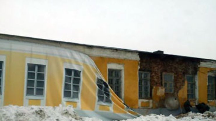 Страшные киевские дома к Евро спрячут за красивыми фотографиями