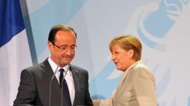 Меркель и Олланд обещают работать вместе