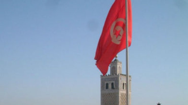 Исламисты в Тунисе передают власть временному кабинету