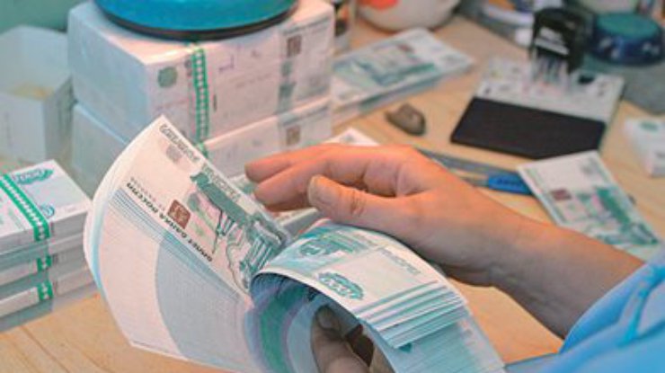 Падение рубля в России бьет исторические рекорды