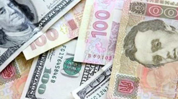 НБУ понизил курс национальной валюты до 11,24 гривен за доллар