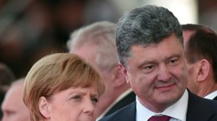 Порошенко и Меркель: главное, чтобы террористам прекратили поставлять оружие