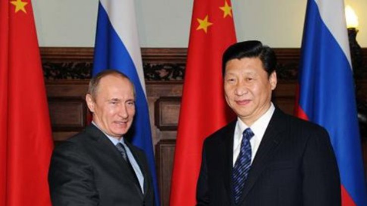 Путин подарил главе Китая Си Цзиньпину Йотафон (фото)