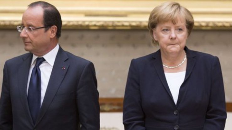 Меркель и Олланд  потребовали прекратить насилие на Донбассе
