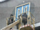В Макеевке со здания горисполкома сепаратисты сняли герб Украины (видео)