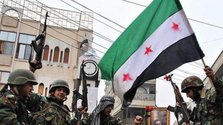 Представители Свободной сирийской армии, которая является повстанческим движением против президента Башара Асада