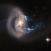 Телескоп "Хаббл" заснял слияние двух галактик (фото)