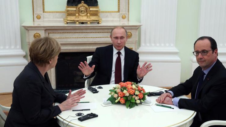 Путин прервал разговор с Меркель и Олландом для протокольной съемки