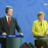 Визит Порошенко в Берлин пытались испортить флагами "Новороссии" (видео)
