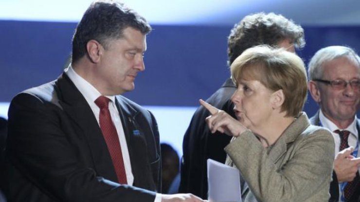 Меркель просят повлиять на Порошенко. Фото profi-forex.org
