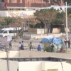 В Тунисе штурмуют здания правительства и жгут участки полиции (видео)
