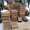 В Донецкой области в тайнике нашли ящики с боеприпасами и взрывчаткой (фото)