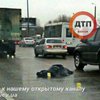 В Киеве мужчина прыгнул с моста и попал под колеса грузовика (фото)