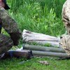 Под Харьковом в лесу нашли пять гранатометов (фото, видео)