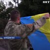 Под Мариуполем боевики минами сбивают флаги Украины