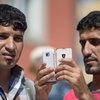 У беженцев в Германии потребуют смартфоны на проверку (видео)