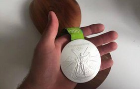 Олимпийский призер продал медаль ради спасения больного ребенка