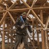 Под Киевом переселенцы строят уникальный дом для участника АТО (фото)
