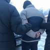 СБУ задержала полицейского при получении взятки с АТОшника (фото)