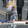 Вперше в історії Олімпійський вогонь ніс робот (відео)