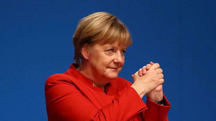 Меркель наградили за настойчивость в приеме беженцев