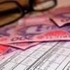 Субсидии на оплату ЖКХ: Кабмин сократит треть получателей 
