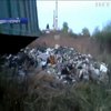 Комунальники скинули купу сміття на околиці Львова
