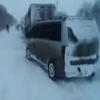 Негода в Україні: із заторів на дорогах рятують людей