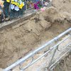 Сын раскопал могилу матери по ее "просьбе"