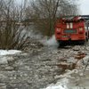 Наводнение под Киевом: село затопило и сковало льдом (фото, видео)