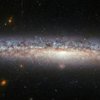 "Хаббл" запечатлел спиральную галактику с редкой сверхновой 