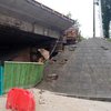 Ливень в Киеве обрушил мост на Телиги (фото)