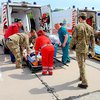 Война на Донбассе: раненых бойцов доставили самолетом в госпиталь