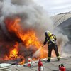 Огонь и клубы дыма: в Испании из аэропорта экстренно эвакуируют людей