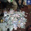 В Киеве ограбили "попрошайку": соцсети взорвало фото с деньгами (фото)