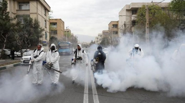 Дезинфекция улиц в иранском городе Навруз, 18 марта, 2020/WANA