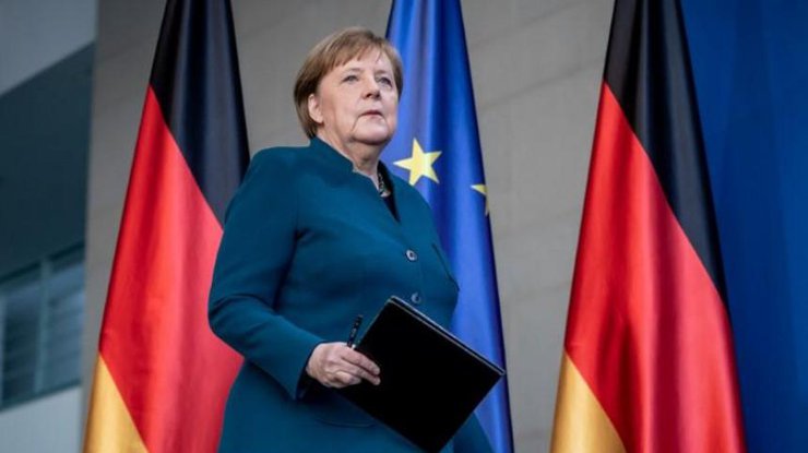 Канцлер Германии Ангела Меркель выступает с заявлением о распространении коронавируса в Берлине, Германия, 22 марта 2020 года REUTERS