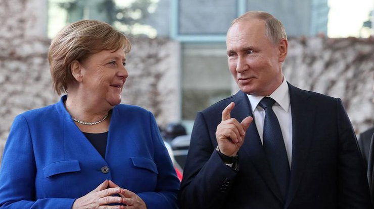 Фото: Путин и Меркель / ТАСС