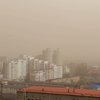 Киев накрыло "карамельное" облако пылевой бури (фото)
