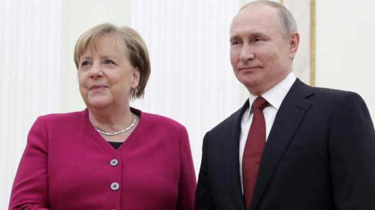 Путин и Меркель / Фото: ТАСС 